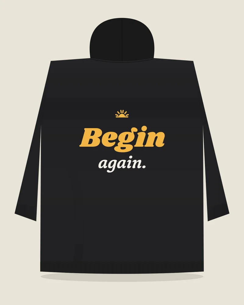 Black hoodie with the print “Begin again.”, back view (illustration)