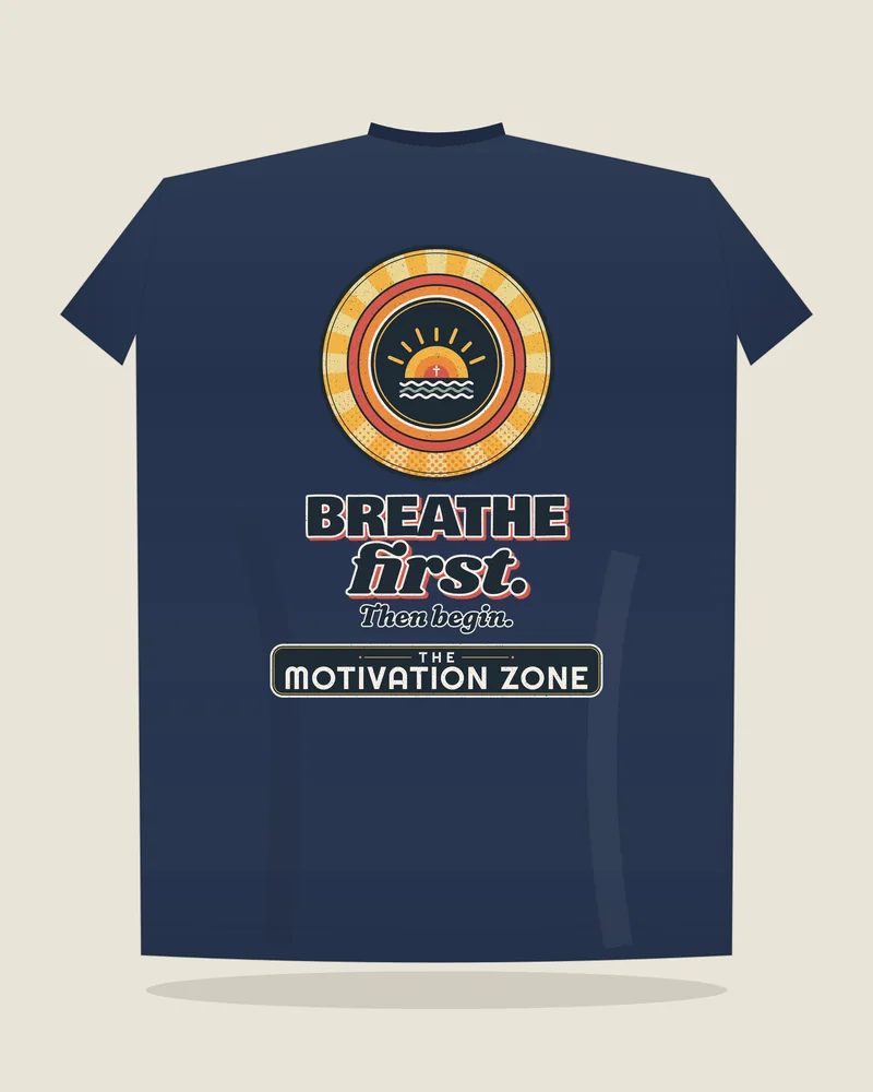 Navy tee with the print “Breathe first.”, back view (illustration)