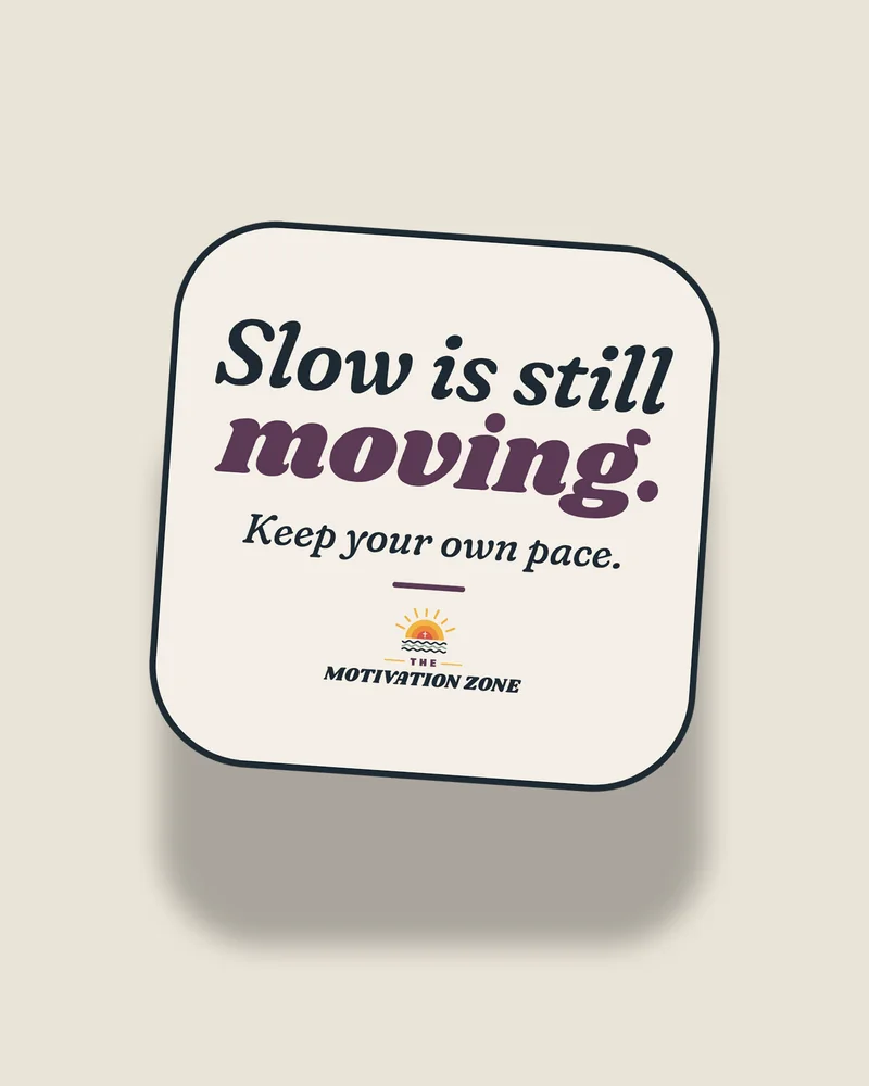 White sticker with the print “Slow is still moving.”, front view (illustration)