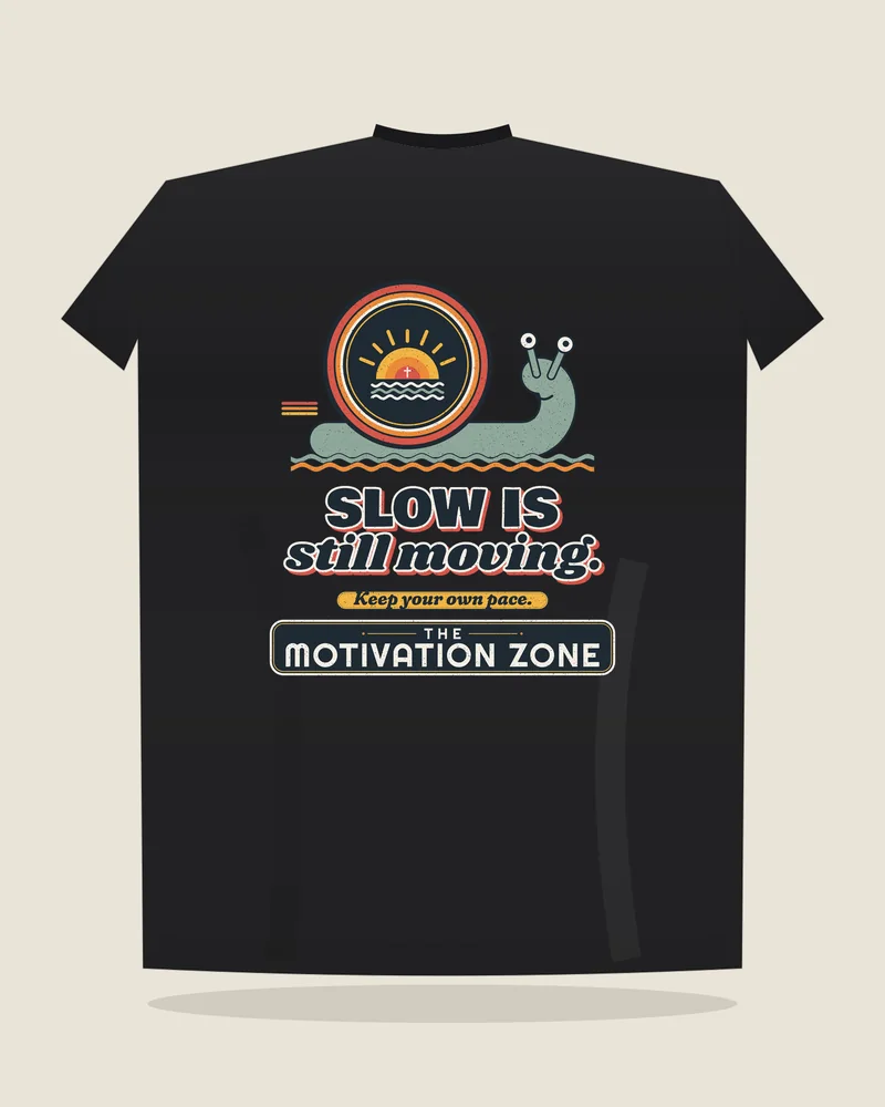 Black tee with the print “Slow is still moving.”, back view (illustration)